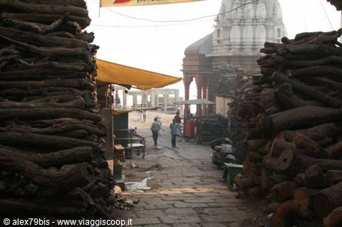 Piles of cremation firewood stacked near Manikarnika Ghat, Varanasi