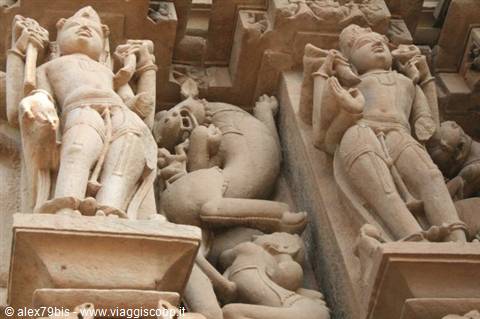 Sandstone carvings of deities and sculpted figures on the temples of Khajuraho