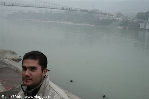 Ram Jhula suspension bridge over the misty Ganges river, Rishikesh