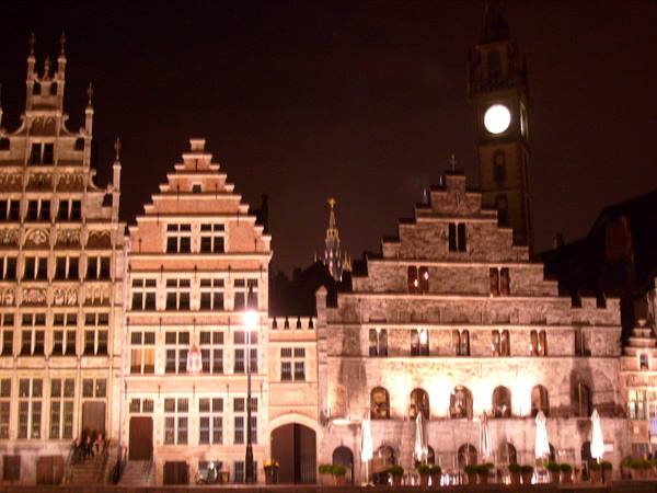 Illuminated Flemish guild houses at night on the Graslei in Ghent