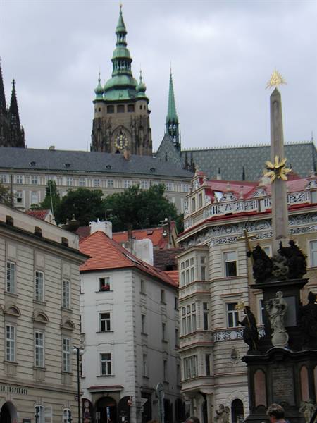 Prague Castle and St Vitus Cathedral above the Holy Trinity column in Malá Strana