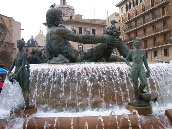Bronze fountain of the Turia River with male figure and maidens, Valencia