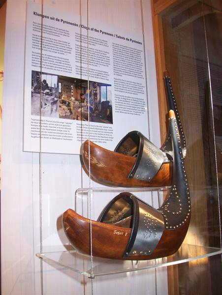 Pyrenees wooden clogs with metal tips displayed in a museum