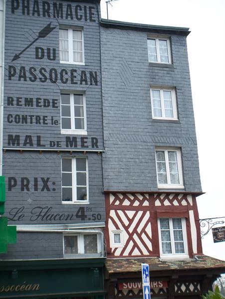 Slate facade with painted sign of the old Pharmacie du Passocean