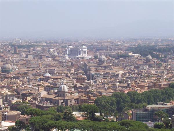 Rome: domes and rooftops in the haze, Vittoriano monument at the center