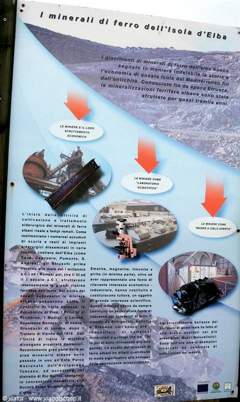 Information panel about iron minerals of Elba Island with historic mining photos