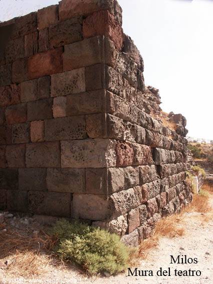 Volcanic stone blocks of the ancient theatre of Milos, harsh light