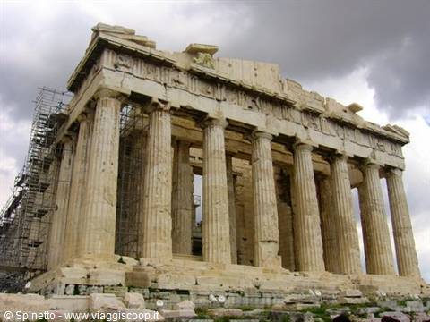 The Parthenon on the Athens Acropolis, marble columns under cloudy sky, restoration scaffolding