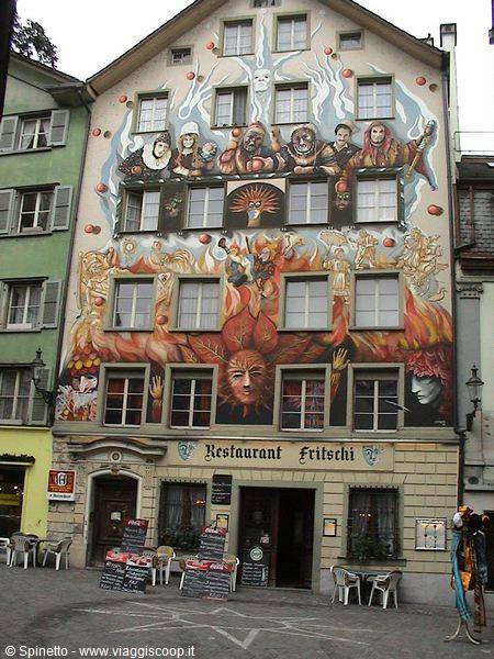 Fantasy mural paintings covering the facade of Restaurant Fritschi in Lucerne