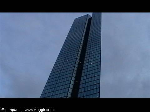 Blue glass skyscraper against a cloudy sky, John Hancock Tower, Boston