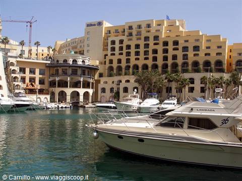 Yachts moored at Portomaso marina in front of the Hilton hotel, St Julian's