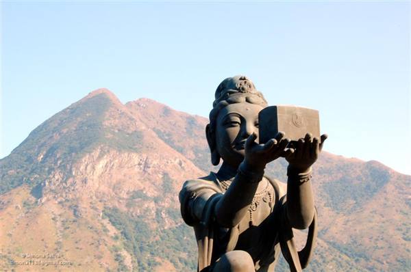 statue in front of the buddha