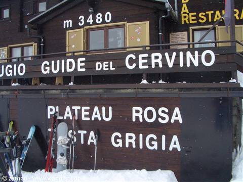 Rifugio Guide del Cervino hut at Plateau Rosa, 3480 meters, skis leaning on snow