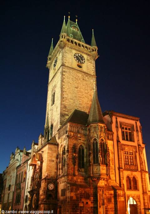 The Old Town Hall astronomical clock tower lit up at night