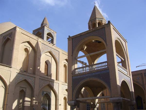 Brick bell tower of Vank Armenian Cathedral, Isfahan, under sunlight