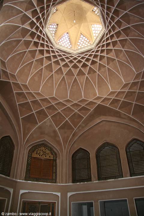 Brick lattice dome with glowing skylight, Dowlat Abad Garden, Yazd