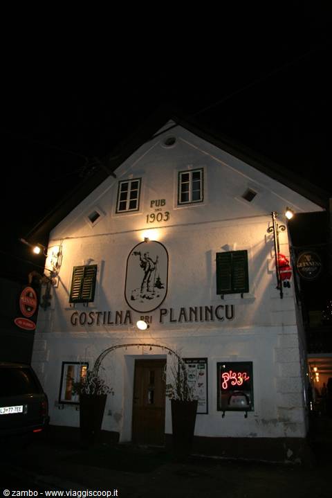 Gostilna Pri Planincu, illuminated 1903 pub at night