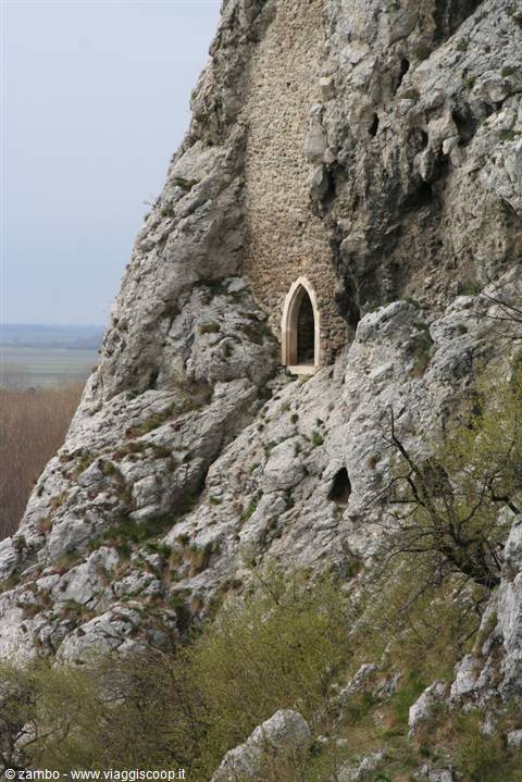 Gothic doorway in the stone wall of Devín castle on the cliff
