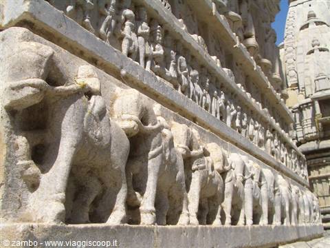 Row of elephants carved in white marble at Ranakpur Jain temple