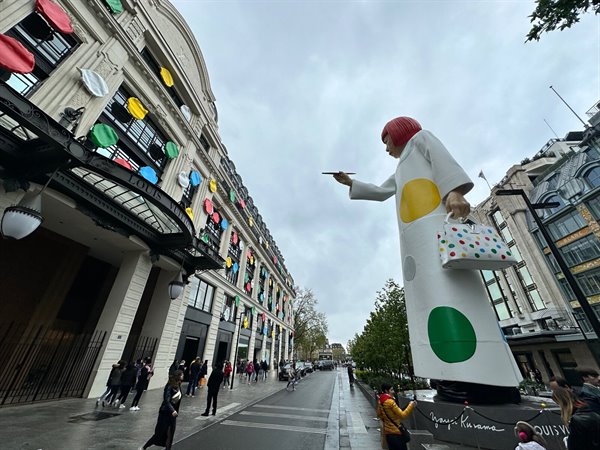 On the boulevards of Paris, Yayoi Kusama colours the Louis Vuitton.