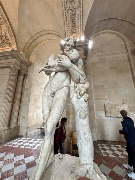 In front of the Silenus with the Infant Jesus at the Louvre, endless wonder.
