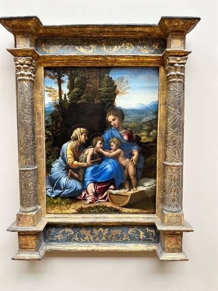 In front of a Renaissance Holy Family, enchanted by the colours.