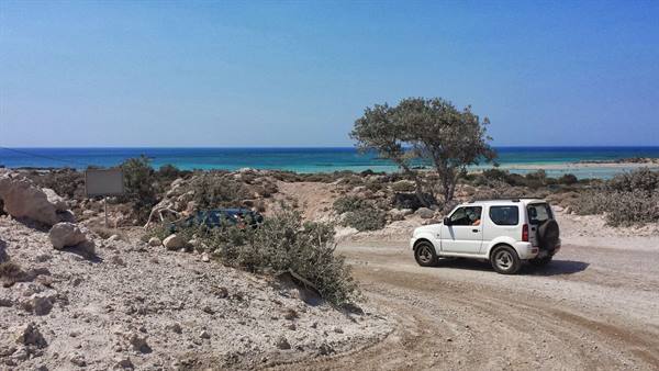 On a jeep towards Elafonisi, between pink sand and turquoise sea.