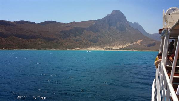 By boat towards the turquoise lagoon of Balos, Crete.