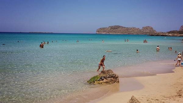 A dip in the turquoise waters of Falasarna, Crete: pure summer.