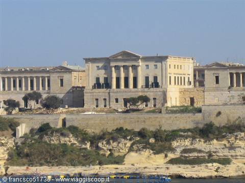 Neoclassical limestone building above the defensive walls of Valletta
