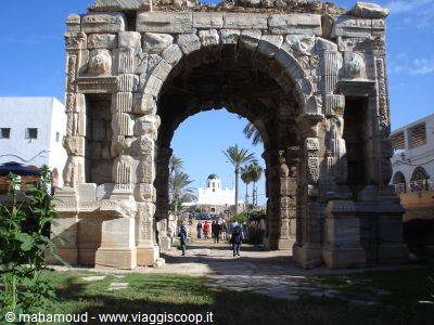 Marcus Aurelius Arch in Tripoli, carved stone with tourists beneath
