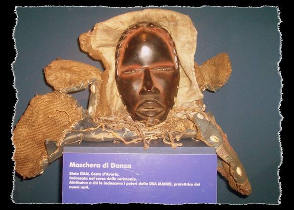 Dan dance mask in carved wood and fibers, ethnographic museum