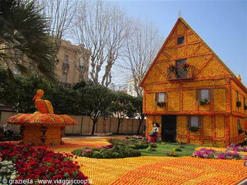 House and pelican sculpture built from citrus fruits, Menton lemon festival garden