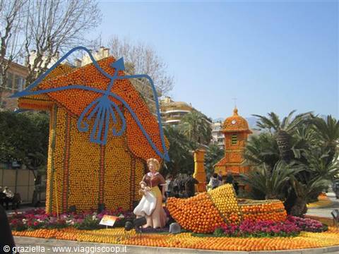 Citrus sculptures at the Menton Lemon Festival, statue and orange boat