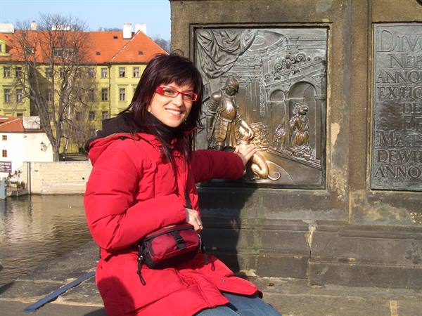 Touching the monument of St. John of Nepomuk...