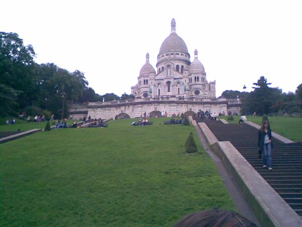 Tourists on the stairs and lawn in front of Sacré-Cœur, Montmartre