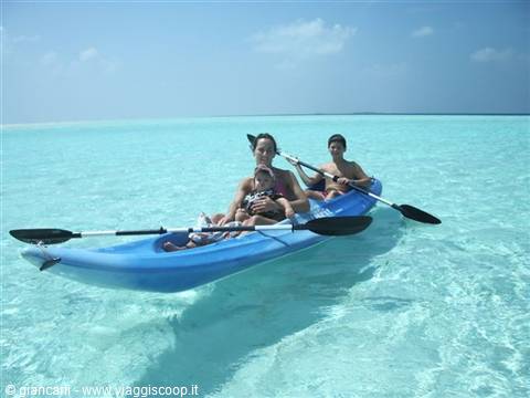 mum and kids in the canoe