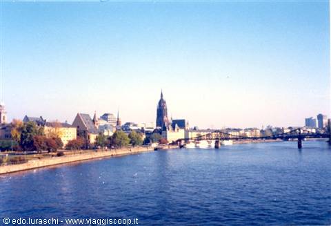 Frankfurt Cathedral and iron bridge over the Main river, clear light