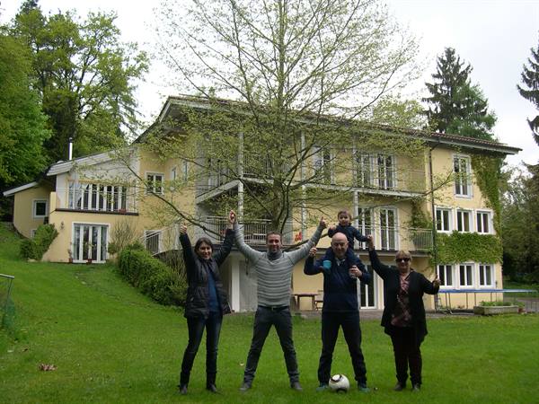 ALL OF US AND IN THE BACKGROUND OUR 'PALACE'