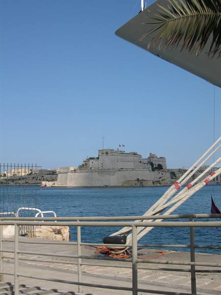 Fort St Angelo across the Grand Harbour, metal railing in foreground