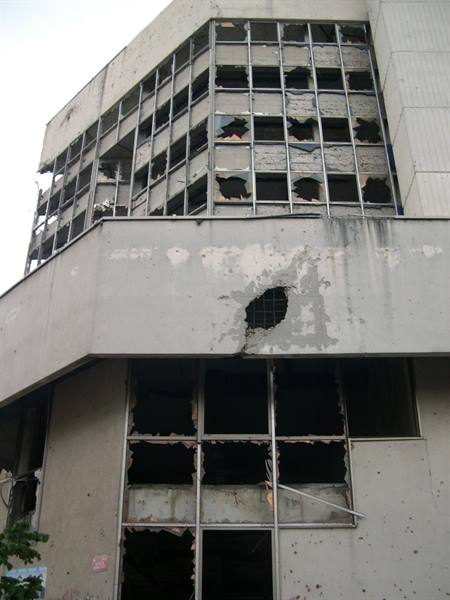A BUILDING GUTTED BY THE BLASTS OF WAR