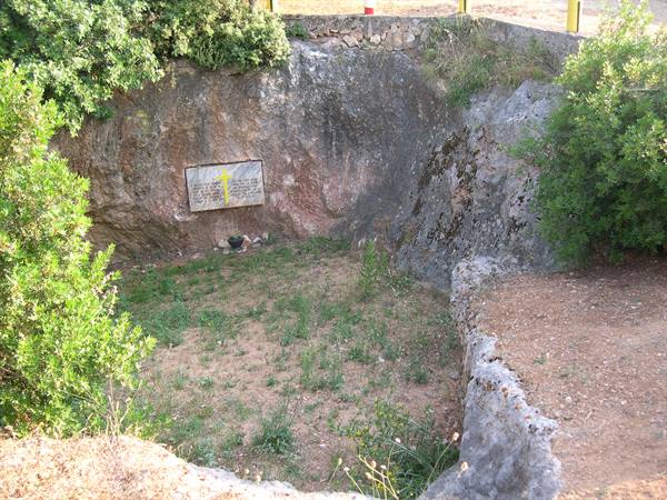 THE PIT IN WHICH 136 ITALIAN OFFICERS WERE SHOT