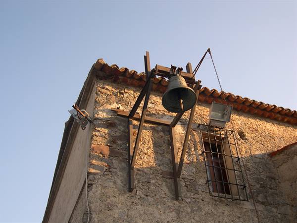 THE VILLAGE BELL . . .