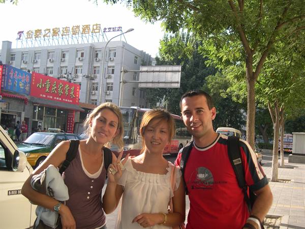 OUR NICE ENGLISH-SPEAKING GUIDE WHO ILLUSTRATED THE SECRETS OF BEIJING TO US