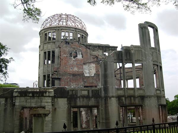 Atomic Bomb Dome in Hiroshima, concrete and brick ruins under cloudy sky