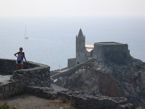 VALENTINA AND IN THE BACKGROUND THE CASTLE OF PORTOVENERE