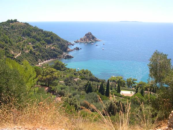THE SUN BEATING DOWN ON THE TUSCAN COAST