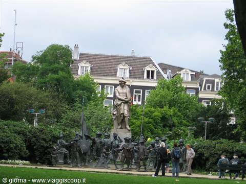 Rembrandt statue with bronze Night Watch figures at Rembrandtplein, Amsterdam