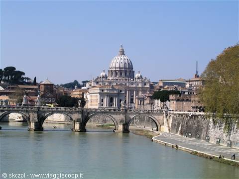 St Peter's dome and stone bridge over the Tevere in Rome