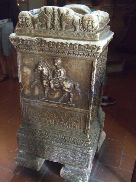 Ancient marble altar with horseman relief and Latin inscription